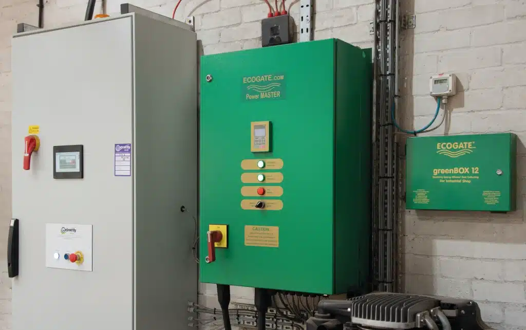 Newly installed Extractly control panel alongside previously installed Ecogate greenBOX-12 controller and PowerMaster carriable speed drive unit.