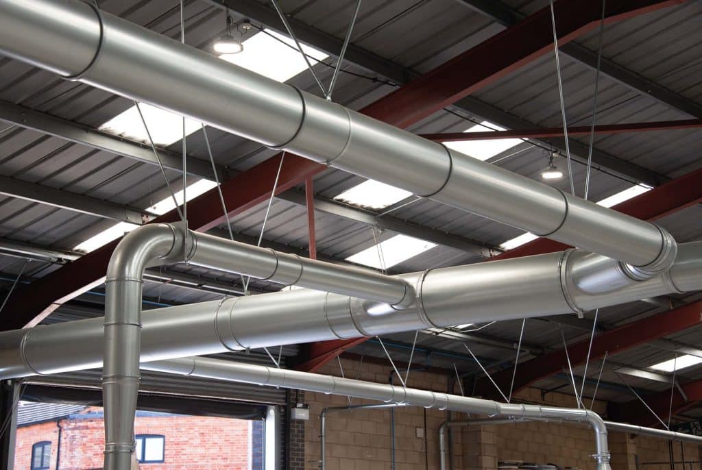 Galvanised steel QF ductwork throughout the factory connects all machines to the extraction system.